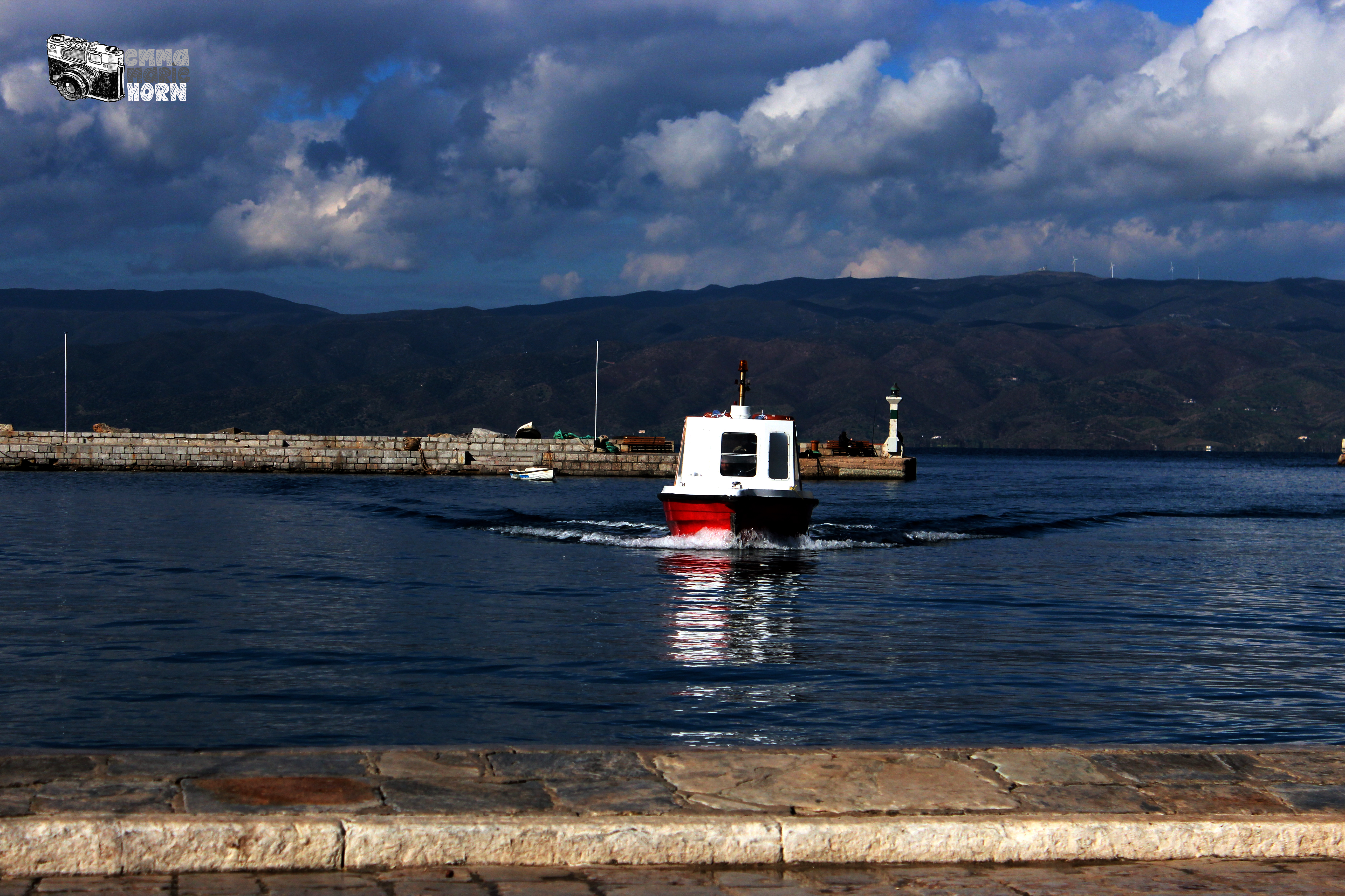 Emma Marie Horn Photography boat approaching dock at Aegina