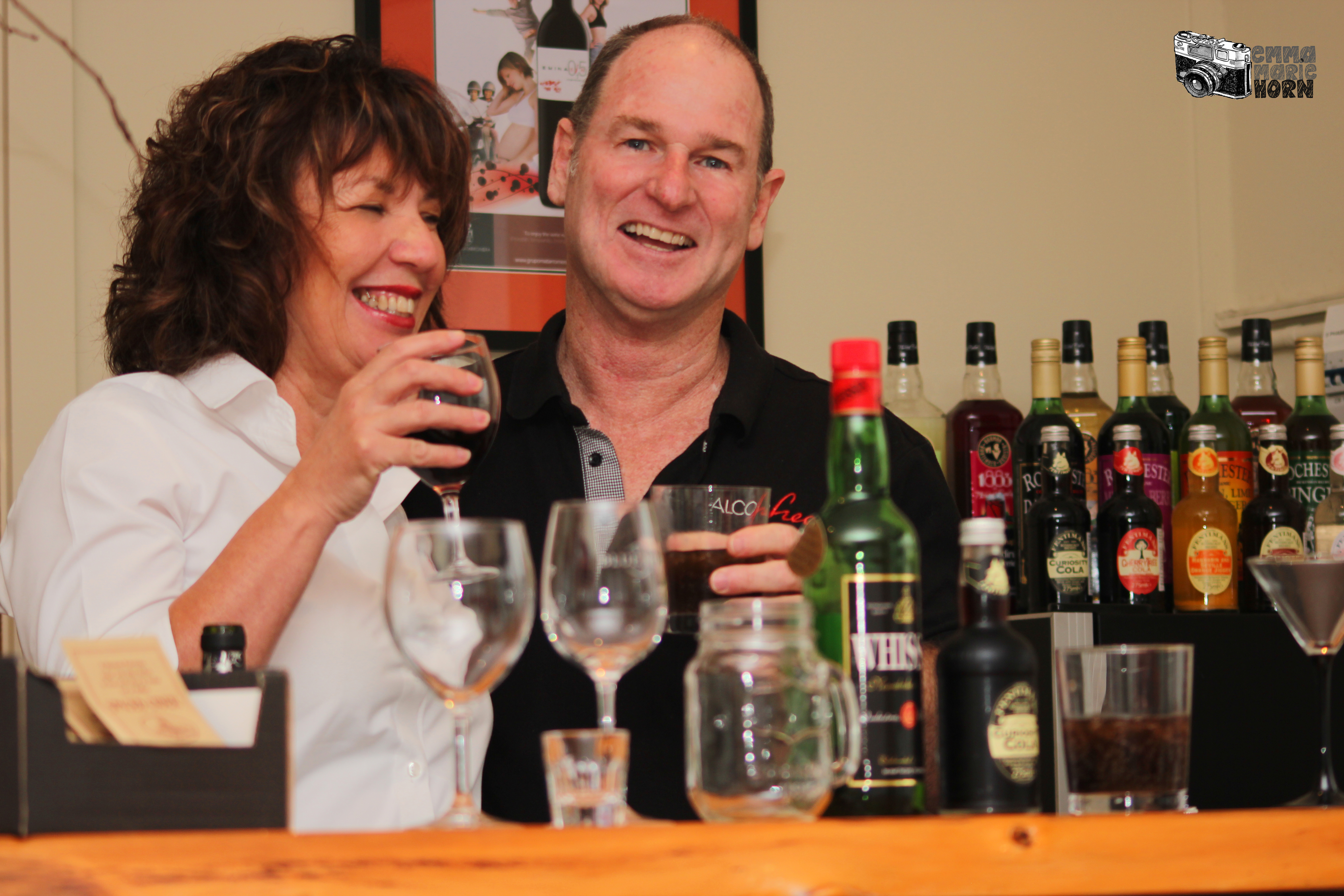 Emma Marie Horn Photography Liked · September 4 · Alcofree owners Trevor and Sandy Schofield mixing drinks behind the bar.